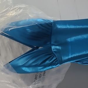 Teal prom/ball gown worn 1 time. Very well taken care of. Size xs